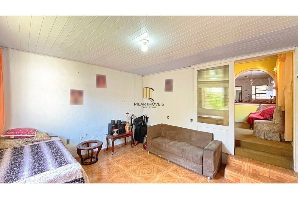 Casa 3 dormitórios no bairro Partenon
