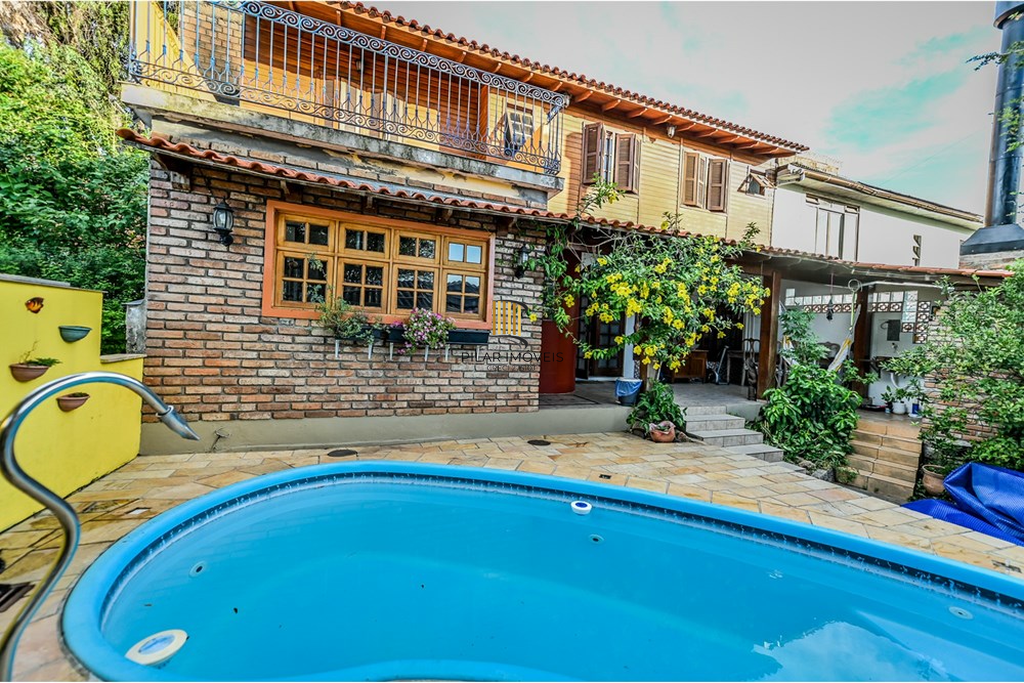 Casa de Condomínio 4 dormitórios no bairro Santa Tereza