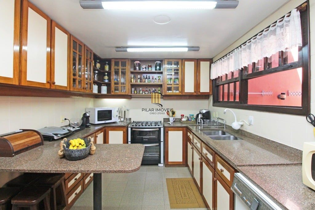 Casa de Condomínio 4 dormitórios no bairro Santa Tereza