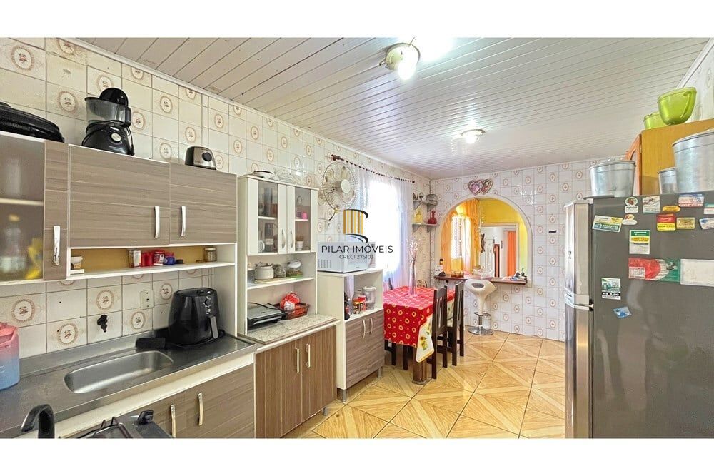 Casa 3 dormitórios no bairro Partenon
