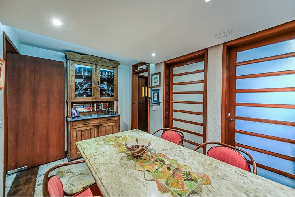 Casa de Condomínio 4 dormitórios no bairro Três Figueiras