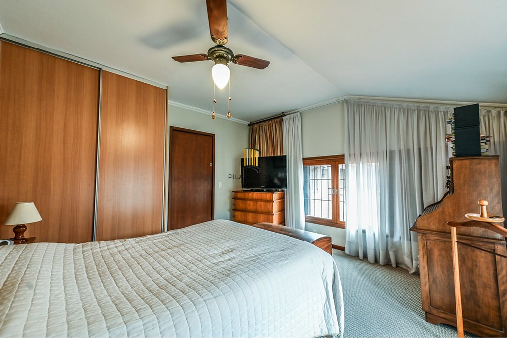 Casa de Condomínio 4 dormitórios no bairro Três Figueiras