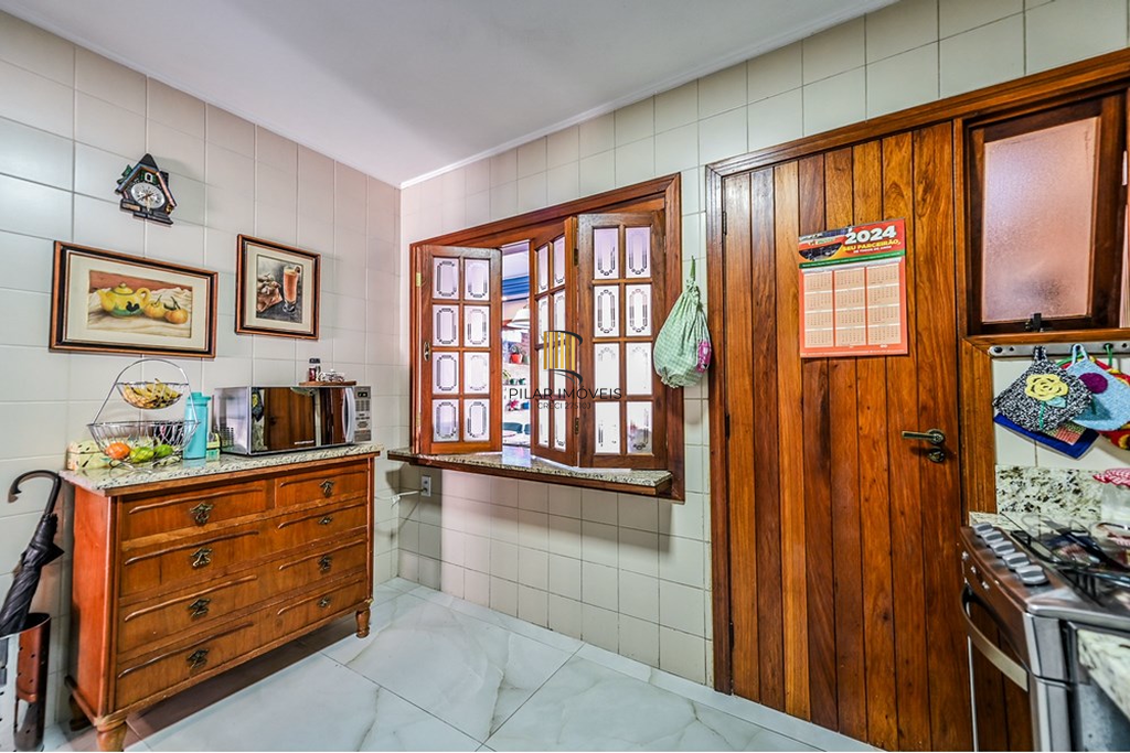 Casa de Condomínio 3 dormitórios no bairro Cavalhada
