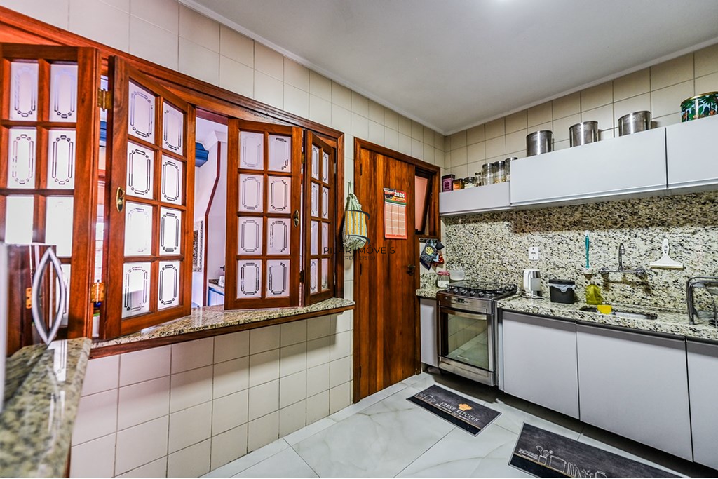 Casa de Condomínio 3 dormitórios no bairro Cavalhada