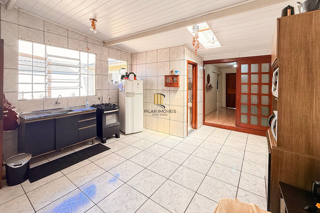 Casa 3 dormitórios no bairro Igara