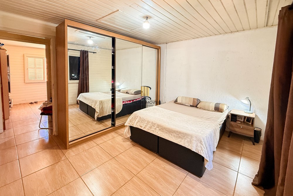 Casa 3 dormitórios no bairro Igara