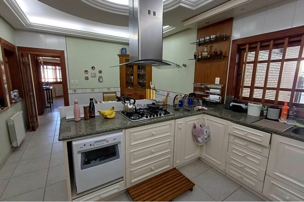 Casa 4 dormitórios no bairro Partenon