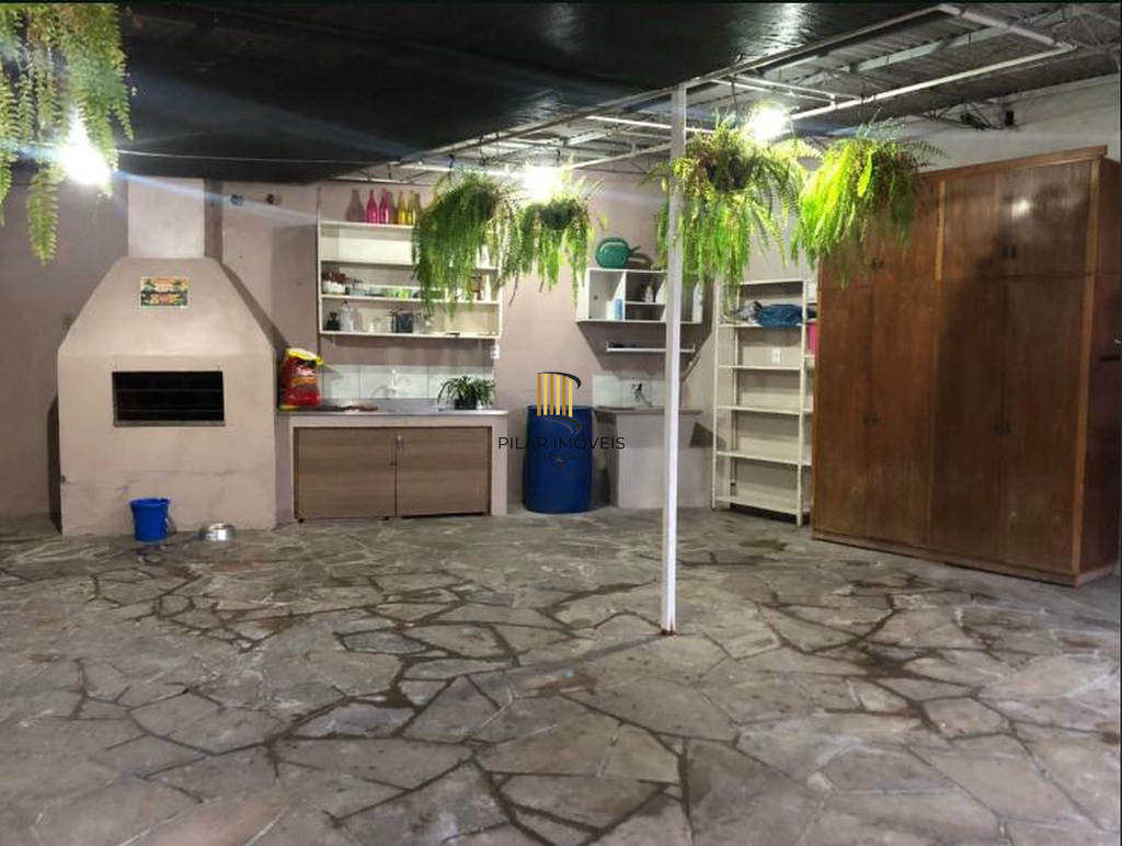 Casa 5 dormitórios no bairro Camaquã