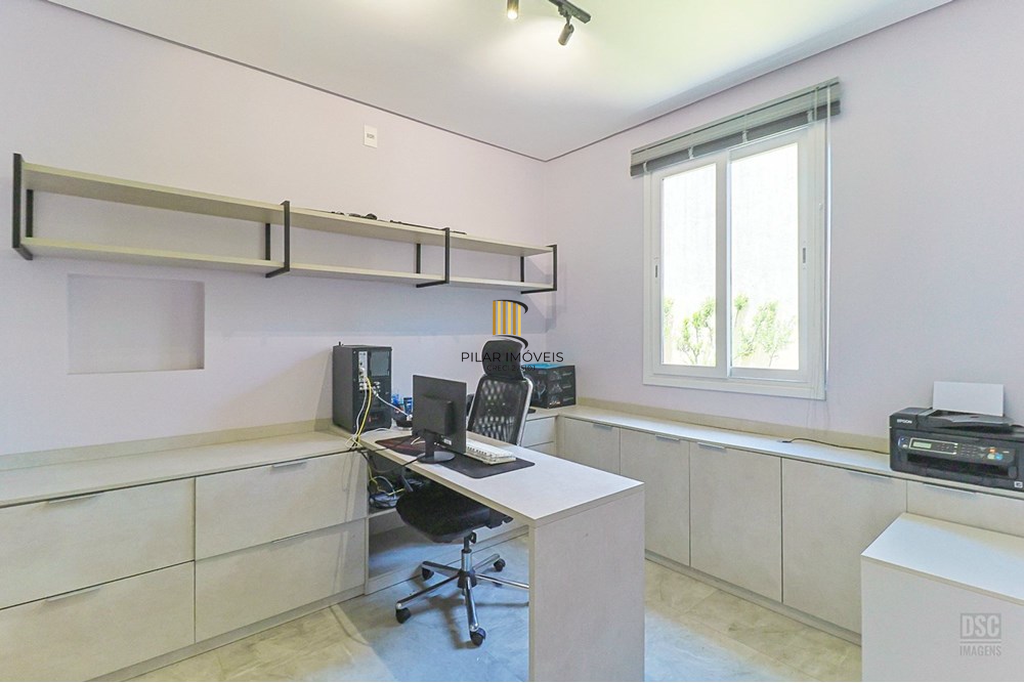 Casa 5 dormitórios no bairro Ipanema