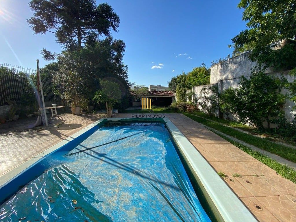Casa 4 dormitórios no bairro Tristeza - Pilar Imóveis