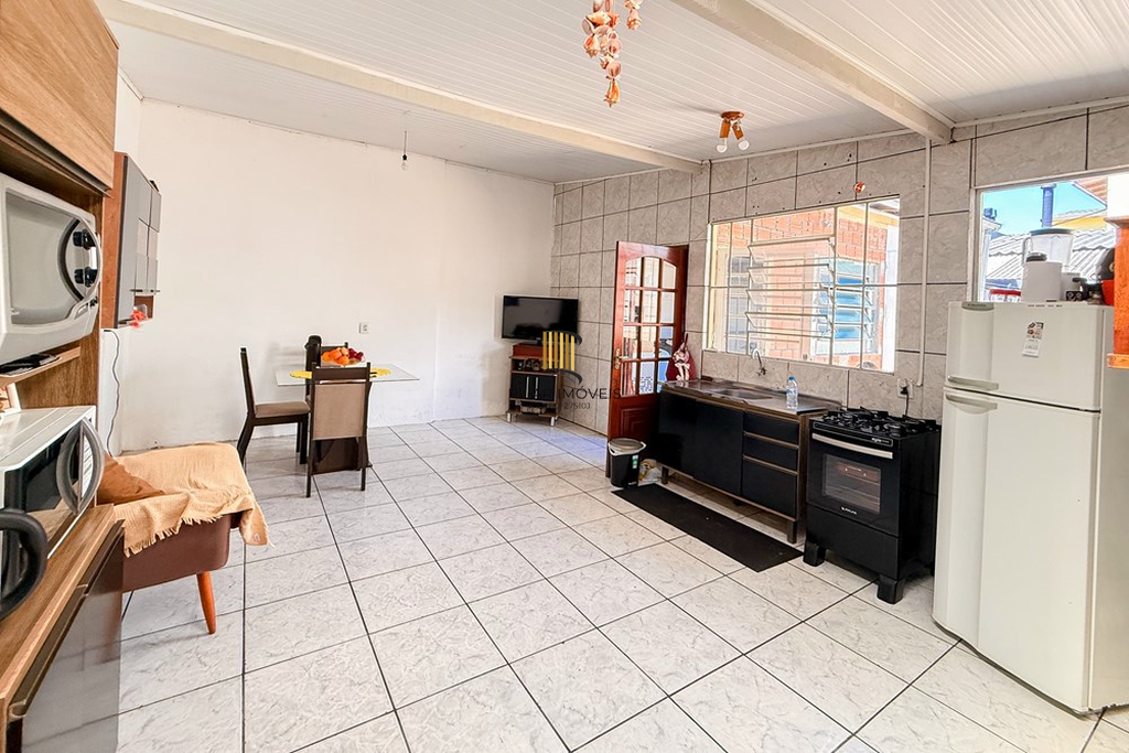 Casa 3 dormitórios no bairro Igara