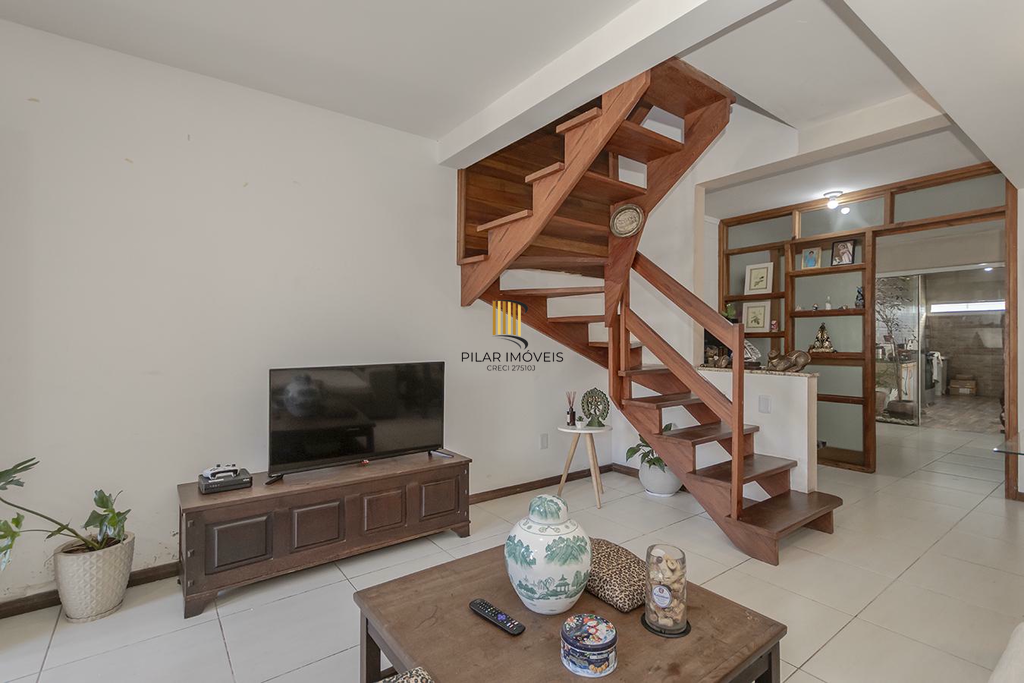 Casa 3 dormitórios no bairro Guarujá