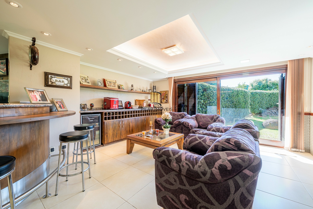 Casa de Condomínio 3 dormitórios no bairro Cavalhada