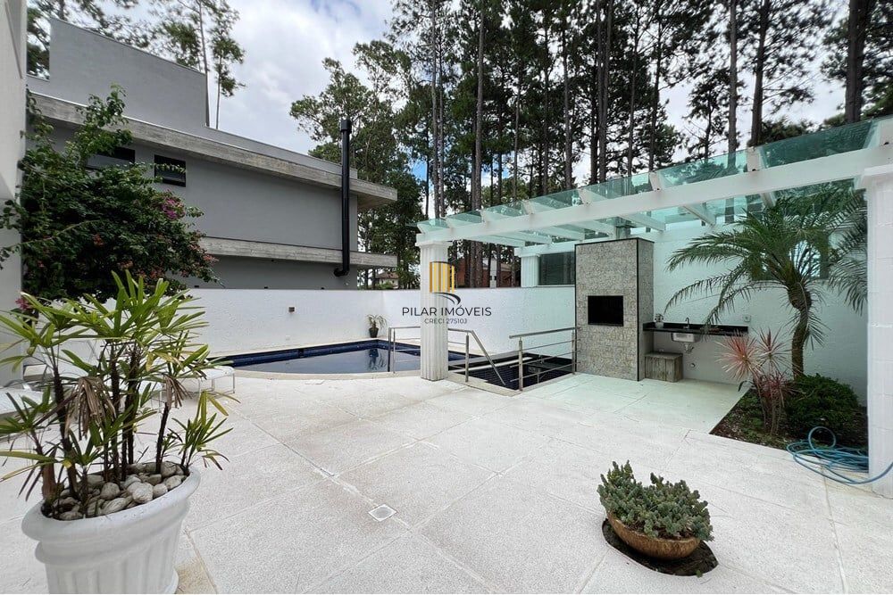 Casa de Condomínio 4 dormitórios no bairro Praia de Atlântida