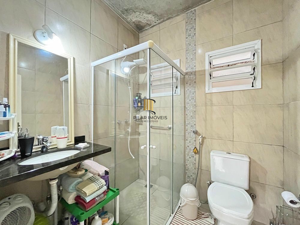 Casa 5 dormitórios no bairro Camaquã