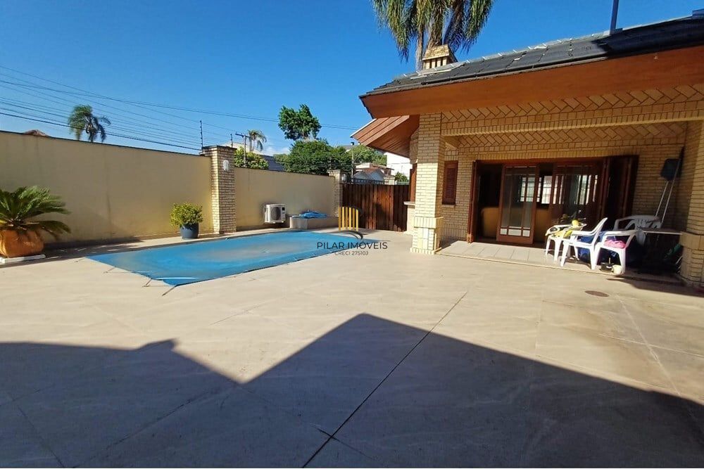 Casa 4 dormitórios no bairro Partenon