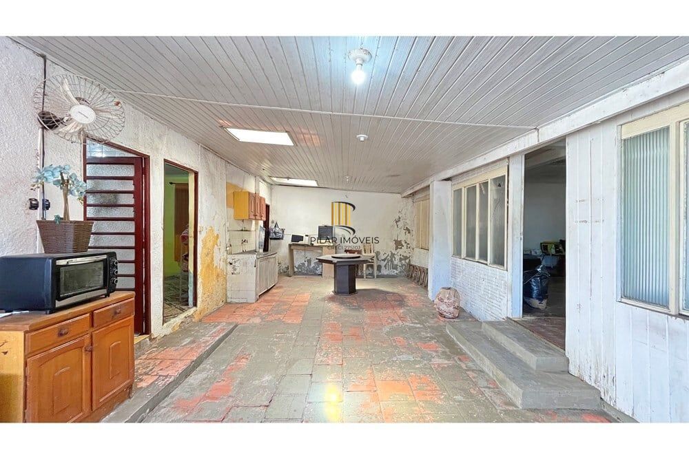 Casa 3 dormitórios no bairro Partenon