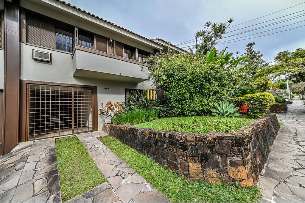 Casa de Condomínio 4 dormitórios no bairro Três Figueiras