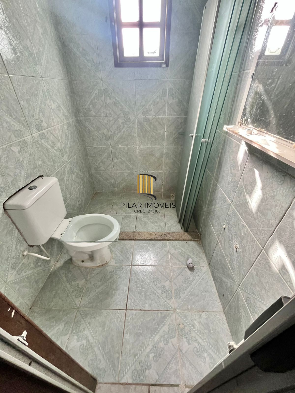 Casa de 2 dormitórios, sendo 1 suíte no Barrio Parque da Matriz, em Cachoeirinha