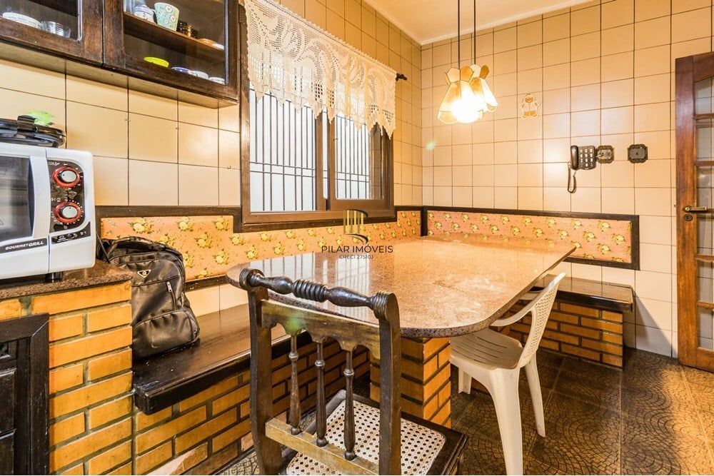 Casa 3 dormitórios no bairro Partenon