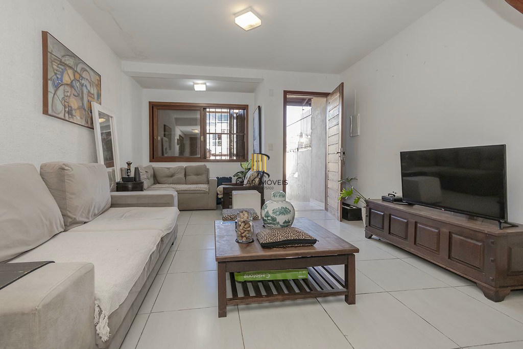 Casa 3 dormitórios no bairro Guarujá