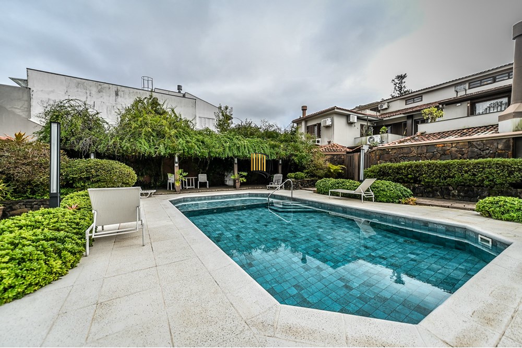 Casa de Condomínio 4 dormitórios no bairro Três Figueiras