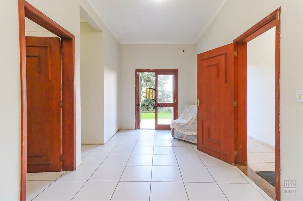 Casa 5 dormitórios no bairro Ipanema