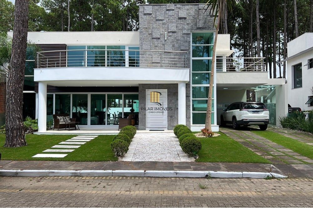 Casa de Condomínio 4 dormitórios no bairro Praia de Atlântida - Pilar Imóveis