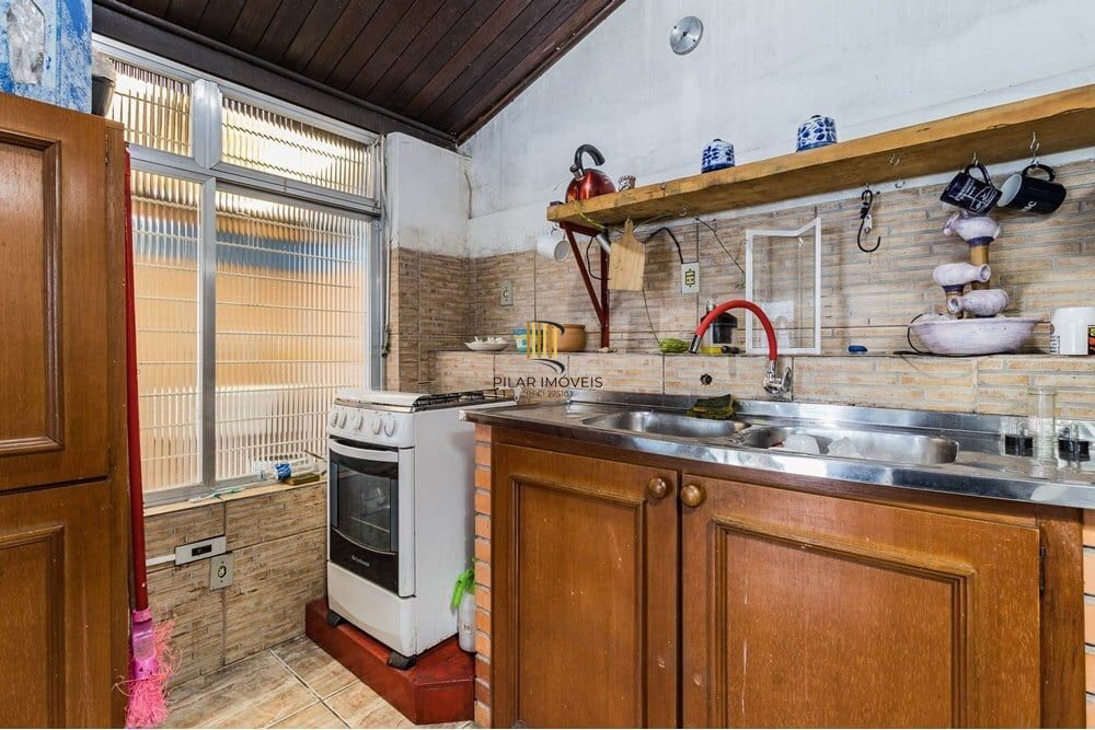 Casa 3 dormitórios no bairro Partenon