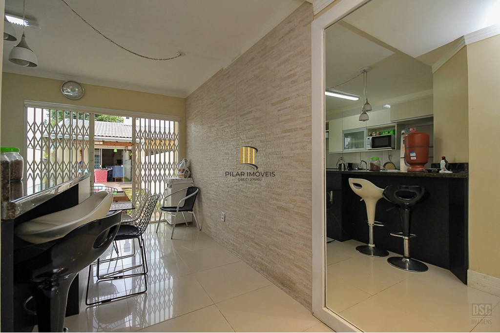 Casa 3 dormitórios no bairro Guarujá
