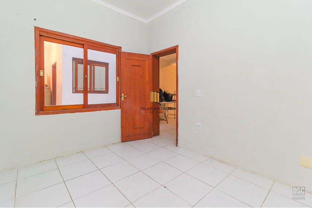 Casa 5 dormitórios no bairro Ipanema