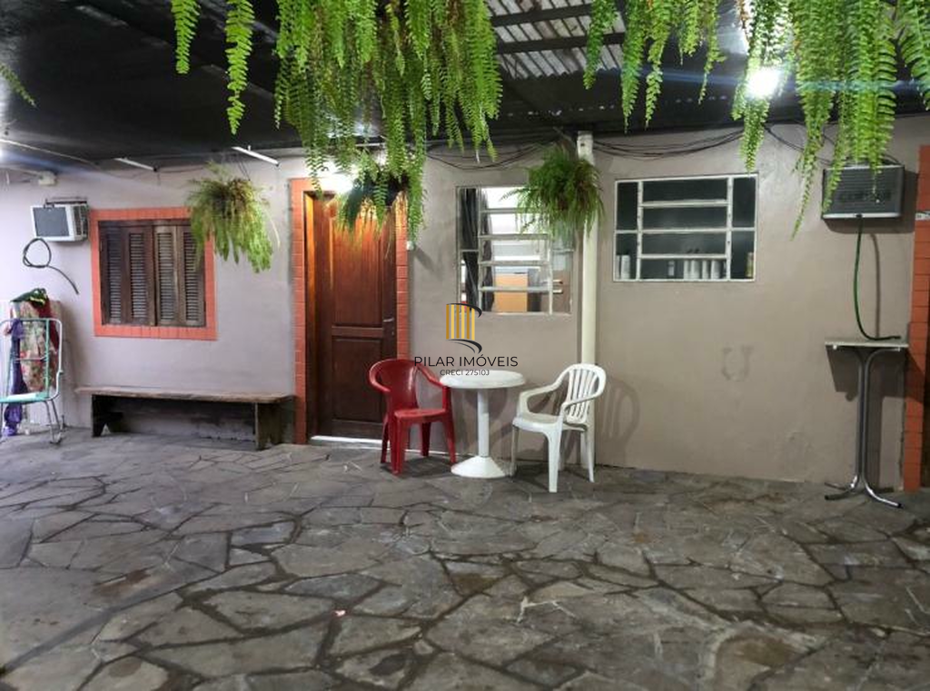 Casa 5 dormitórios no bairro Camaquã
