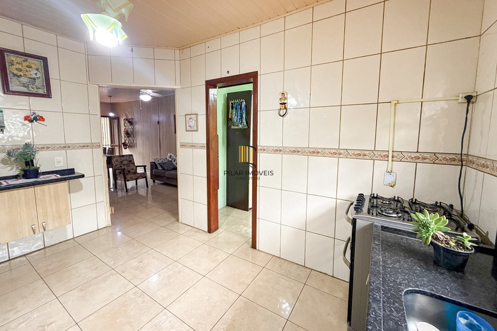 Casa 3 dormitórios no bairro Igara