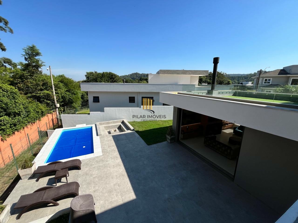 Casa de Condomínio 4 dormitórios no bairro Vila Nova