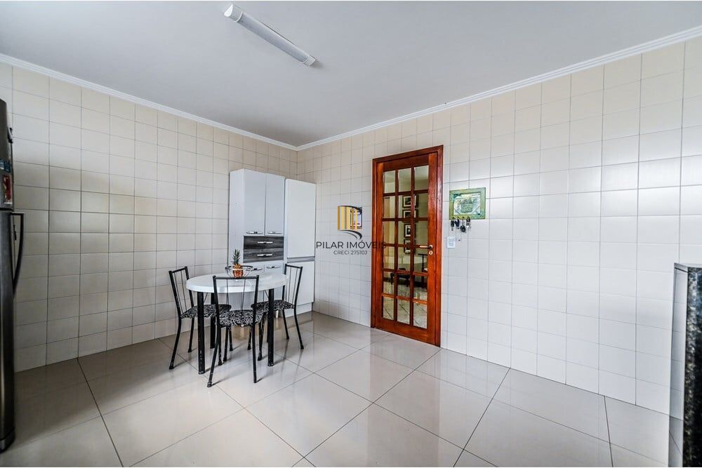 Casa de Condomínio 4 dormitórios no bairro Santa Tereza