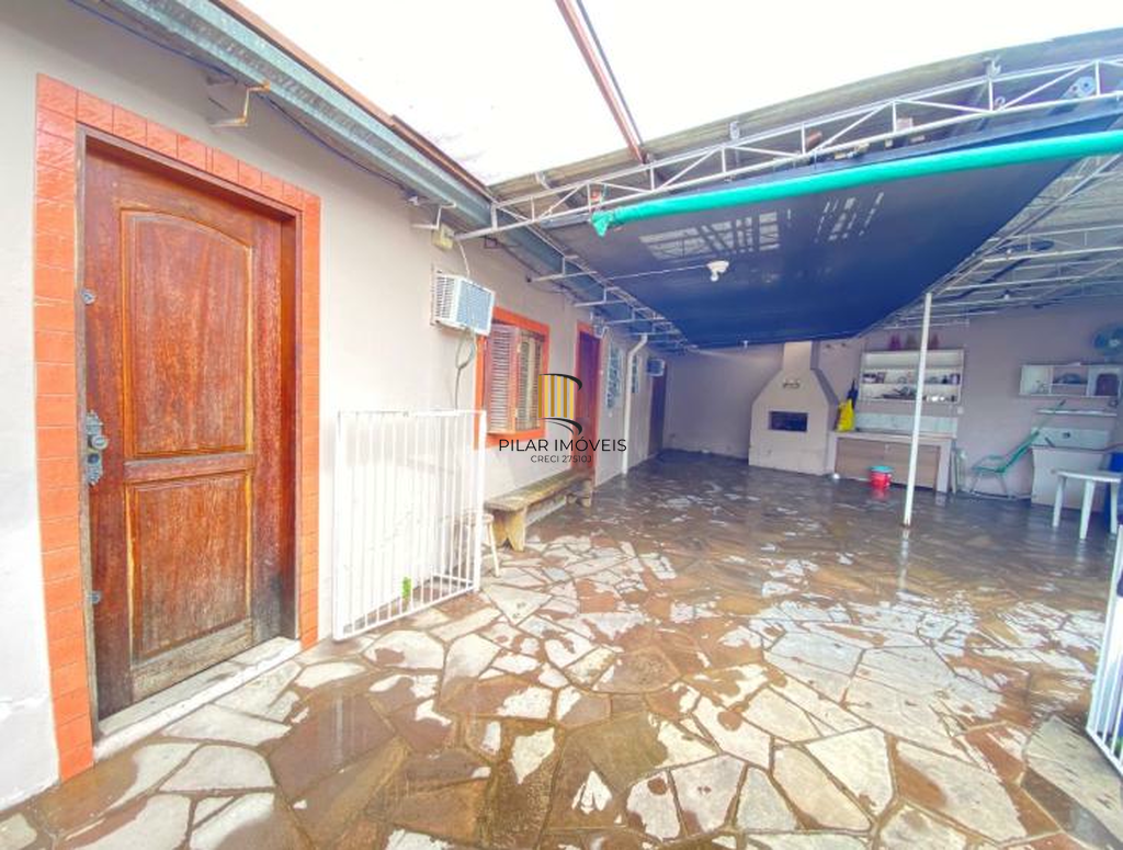 Casa 5 dormitórios no bairro Camaquã