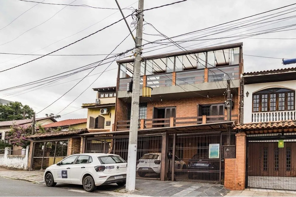 Casa 3 dormitórios no bairro Partenon