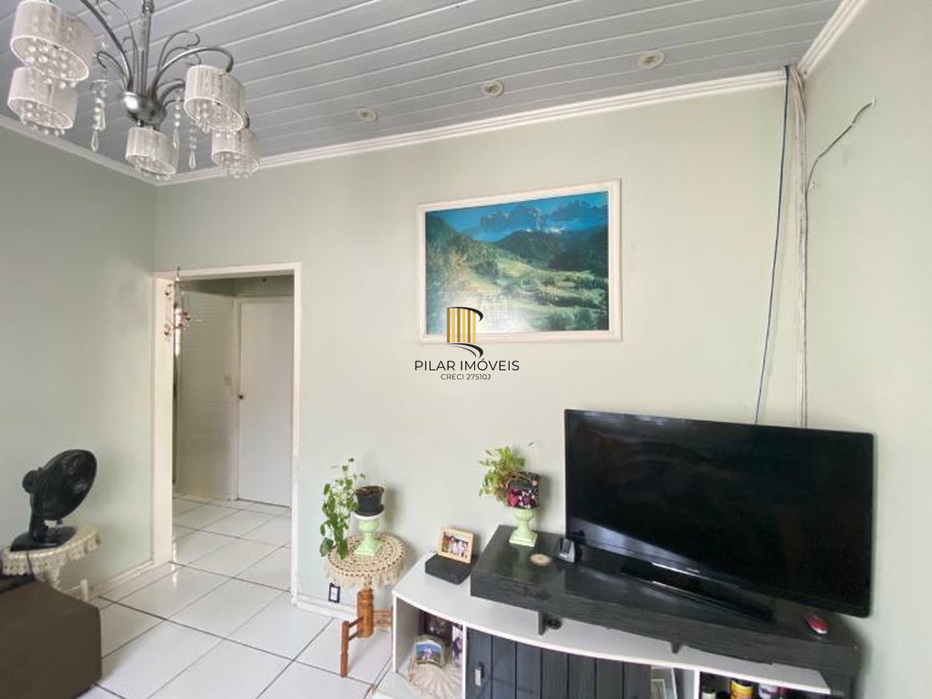 Casa 5 dormitórios no bairro Camaquã