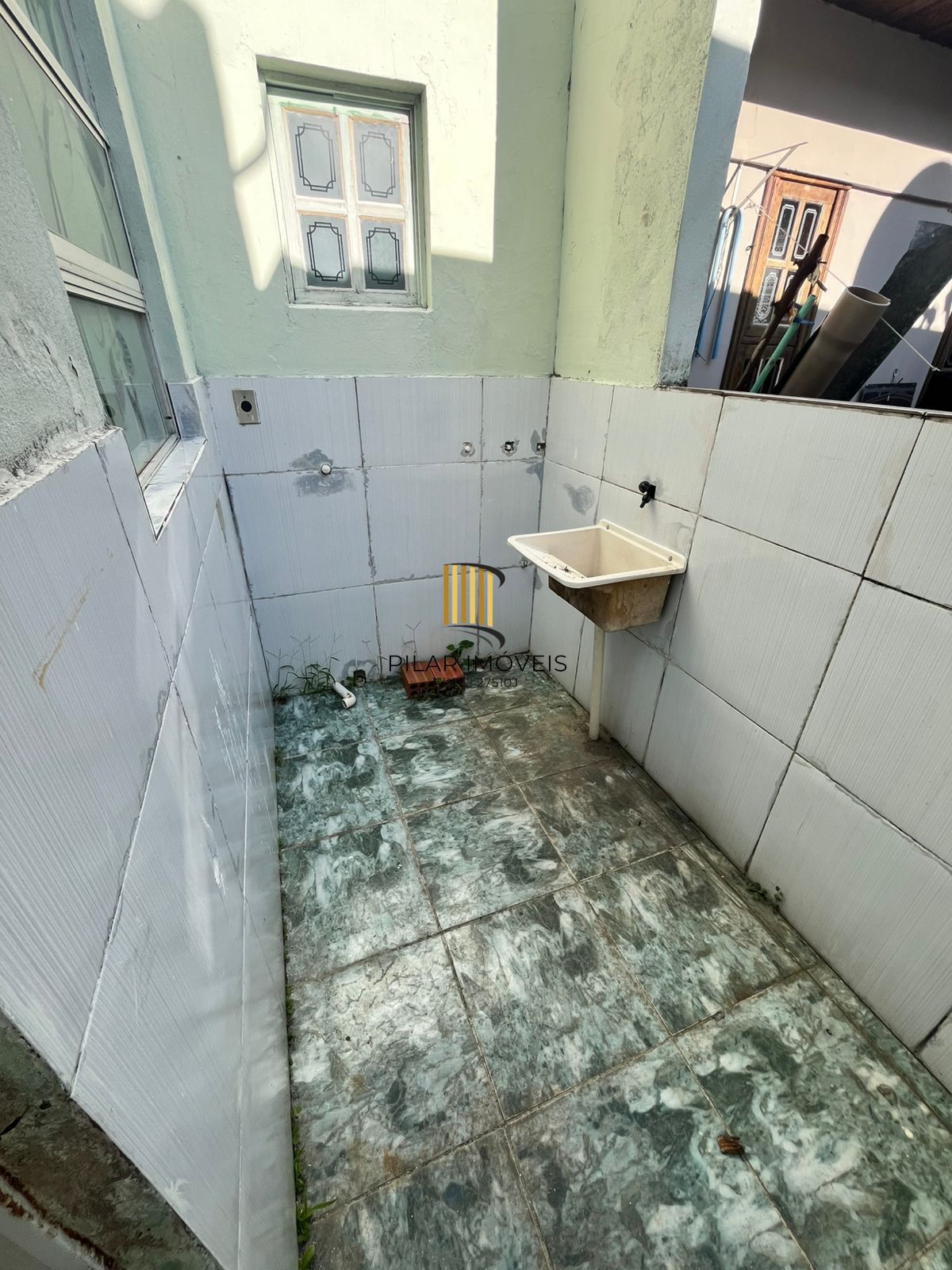 Casa de 2 dormitórios, sendo 1 suíte no Barrio Parque da Matriz, em Cachoeirinha