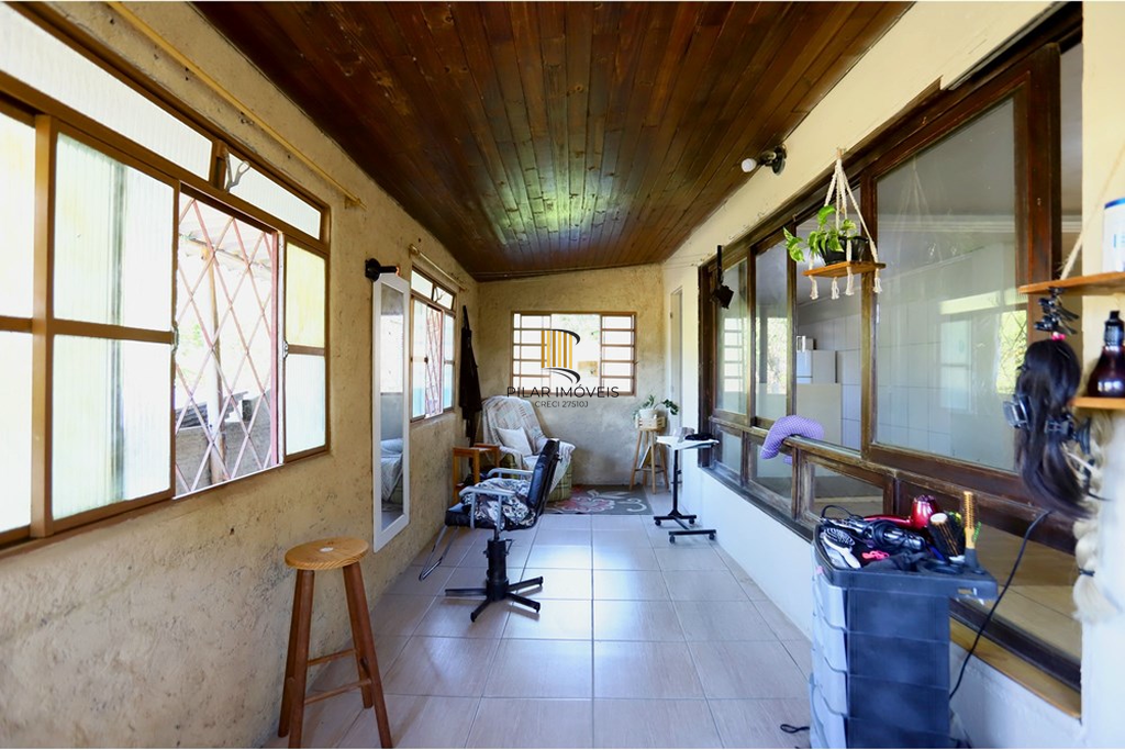 Casa 6 dormitórios no bairro Lomba do Pinheiro