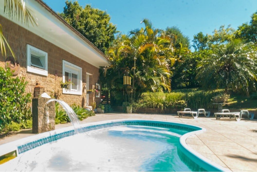Casa de Condomínio 3 dormitórios no bairro Tarumã
