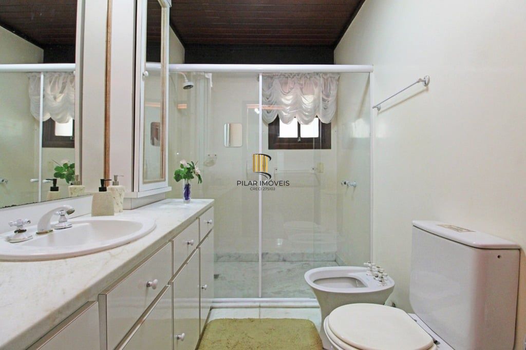Casa de Condomínio 4 dormitórios no bairro Santa Tereza