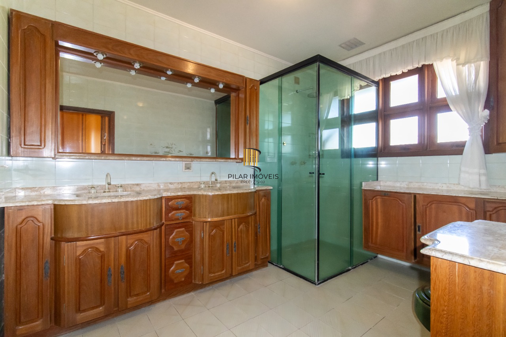 Casa 5 dormitórios no bairro Partenon