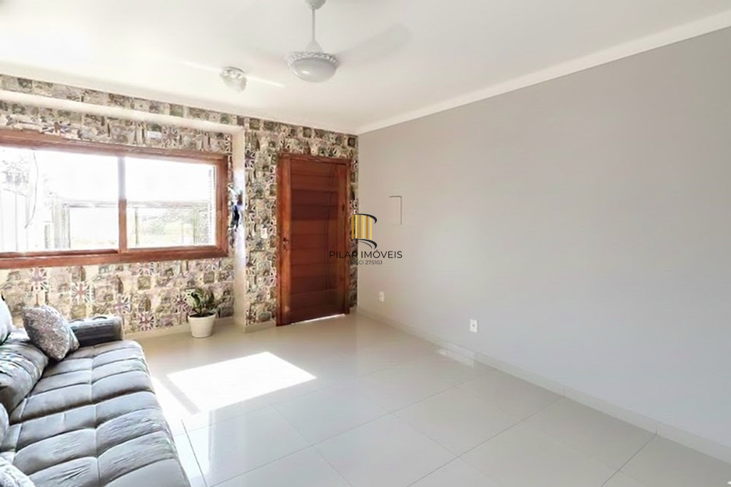 Casa 3 dormitórios no bairro Guarujá