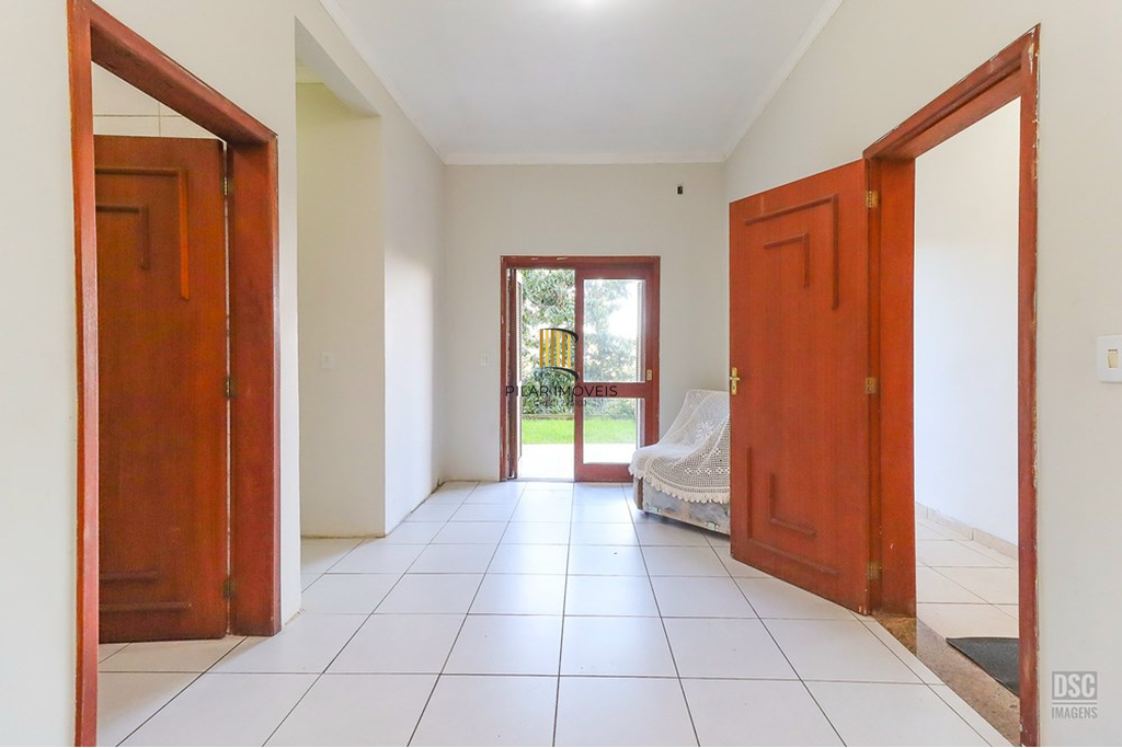 Casa 5 dormitórios no bairro Ipanema