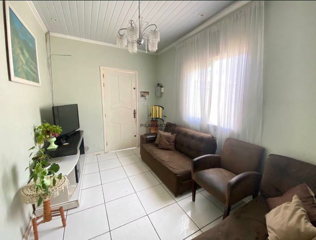 Casa 5 dormitórios no bairro Camaquã