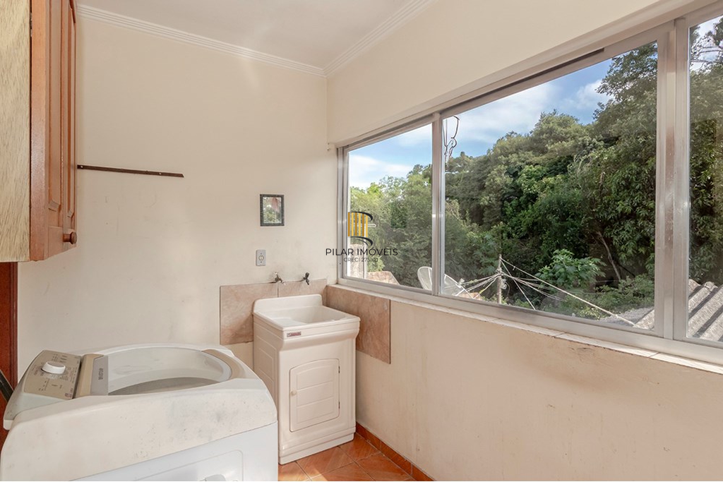 Casa 5 dormitórios no bairro Glória