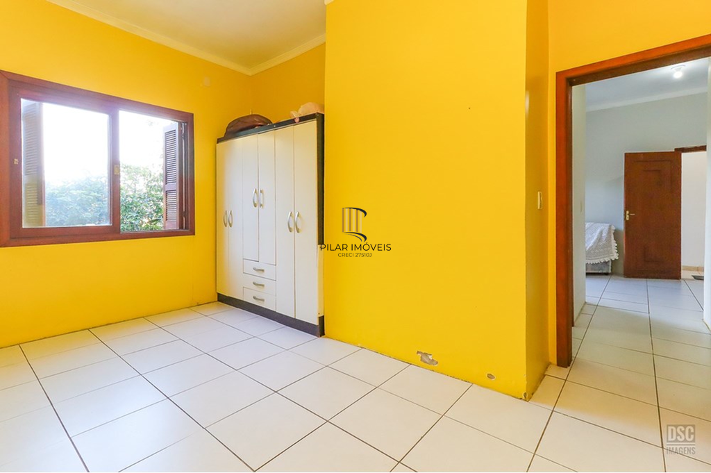 Casa 5 dormitórios no bairro Ipanema