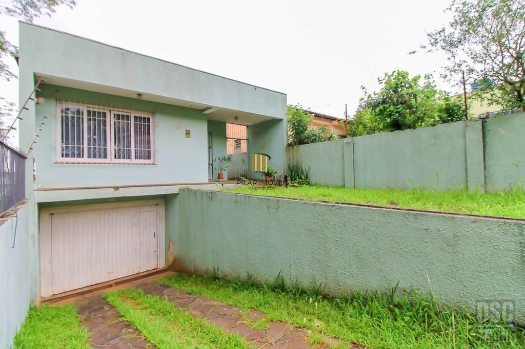 Casa 3 dormitórios no bairro Glória