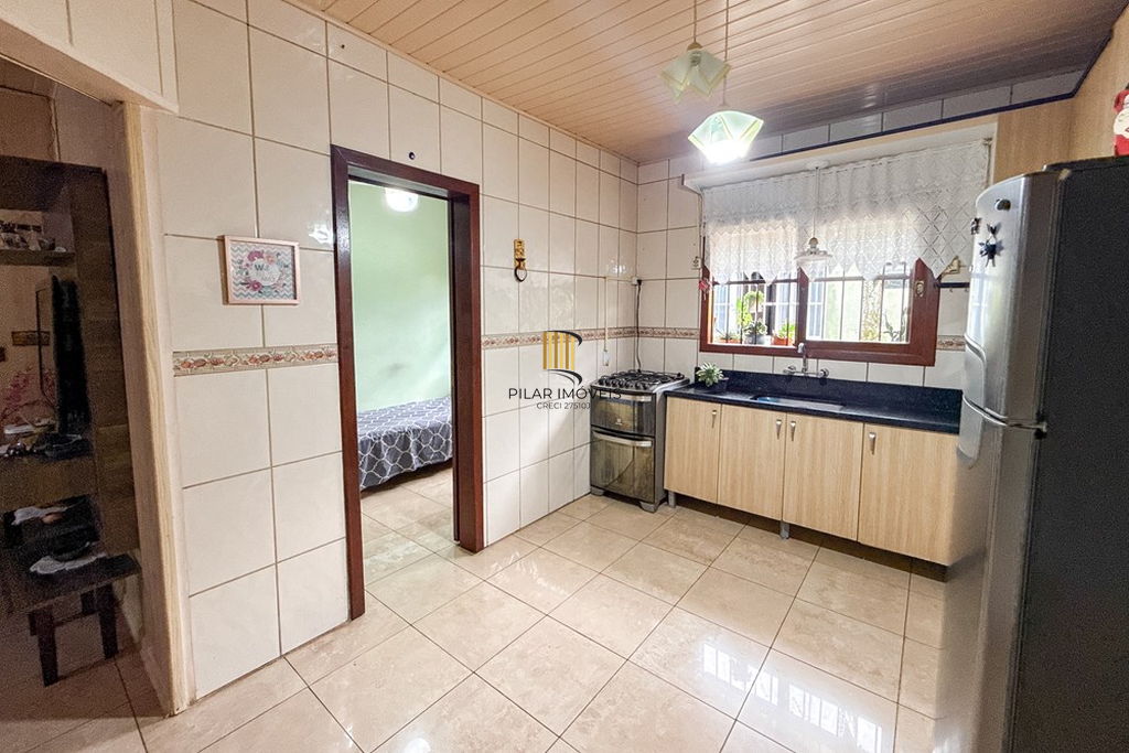 Casa 3 dormitórios no bairro Igara